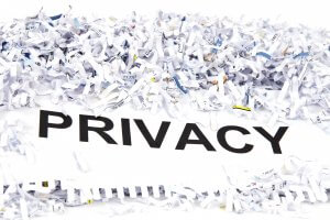 shredded paper around the word privacy